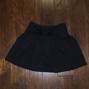 Black Kate Spade skirt, with a bow on the front